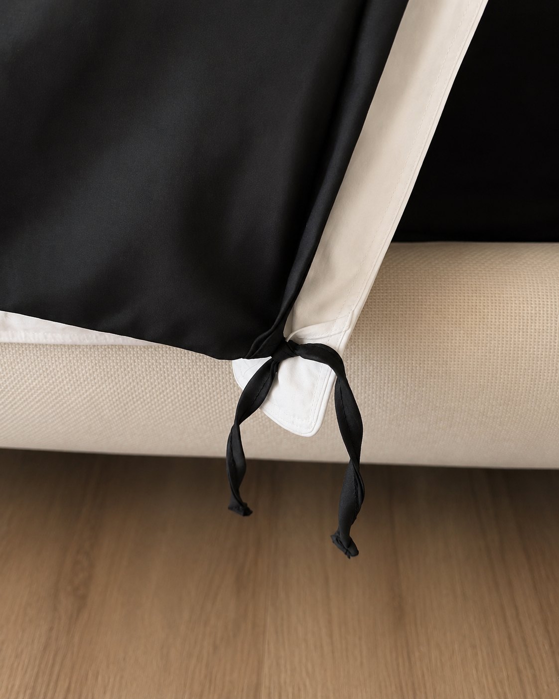 Amarração interna que prende o duvet dentro da capa